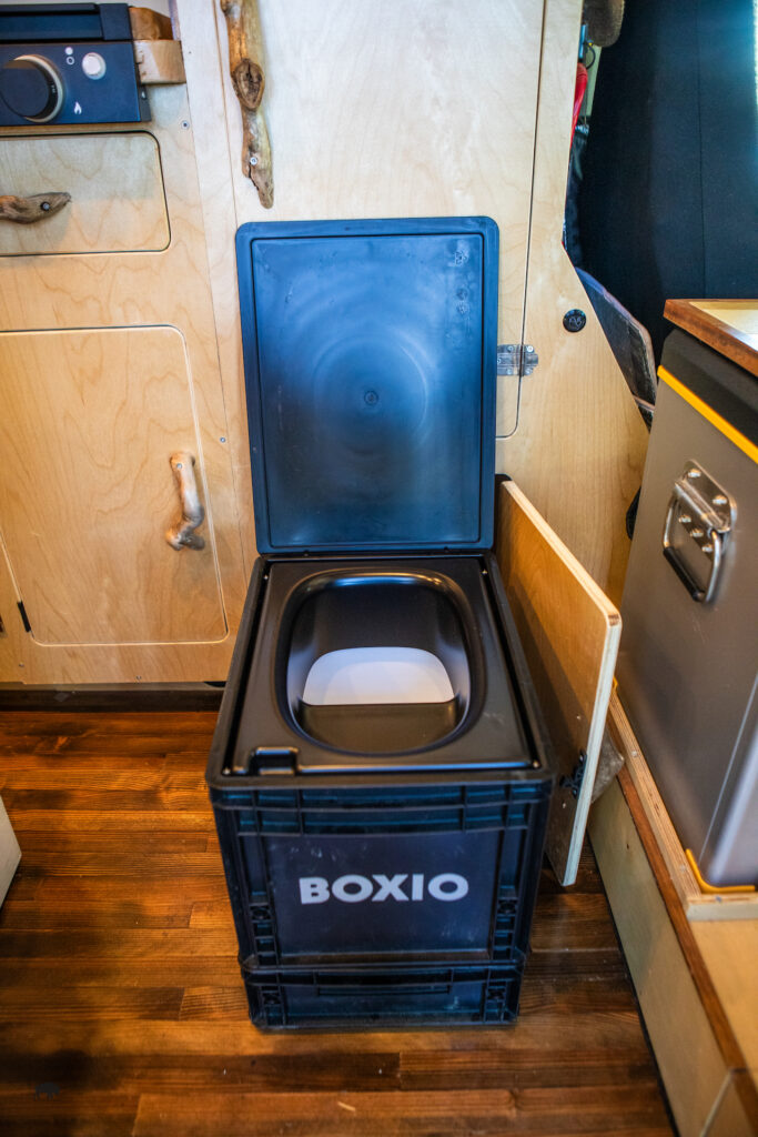 Boxio Compost Toilet open and upclose inside a campervan