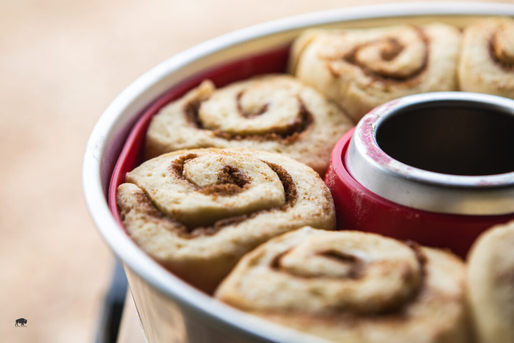 cinnamon rolls made using the omnia stovetop oven in a campervan