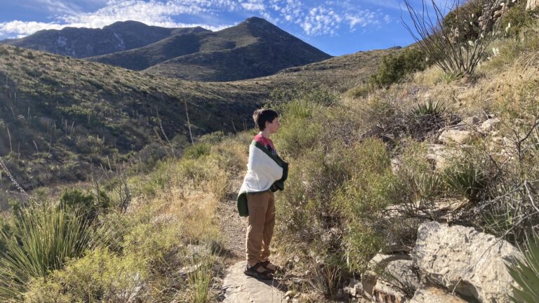 Boy hiking at Guadalupe Mountains National Park, one of the best winter RV destinations in Texas