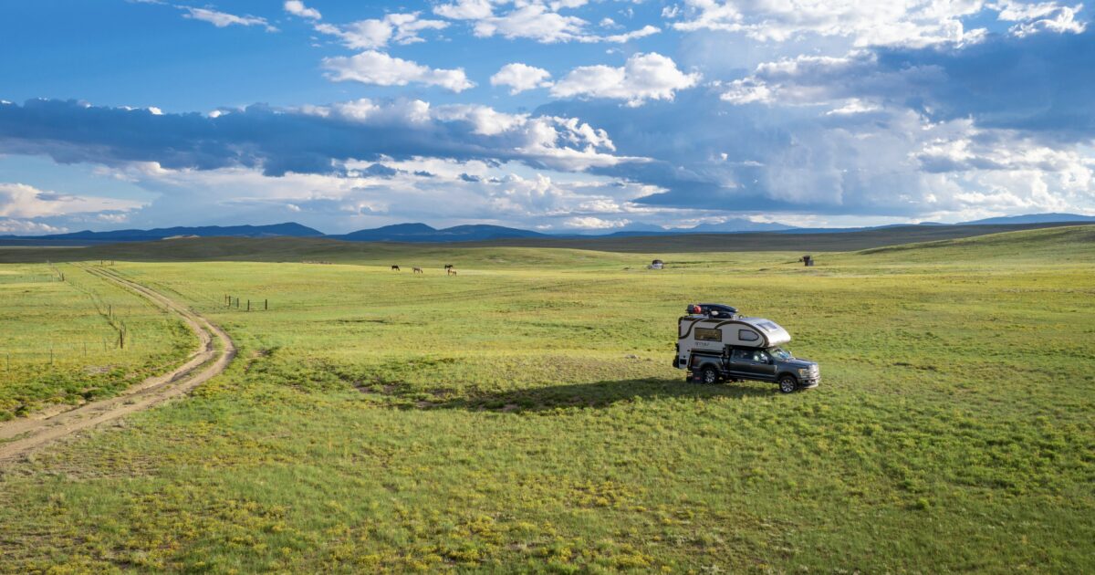 Lightweight truck camper with bathroom
