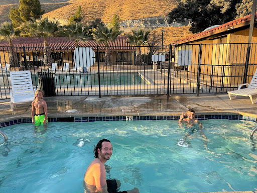 family enjoying the pool in a thousand trail campground