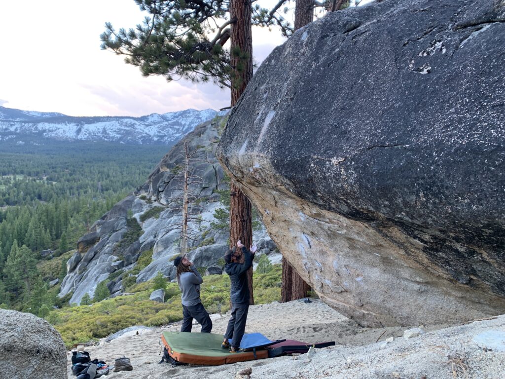 two people practicing climbing in california