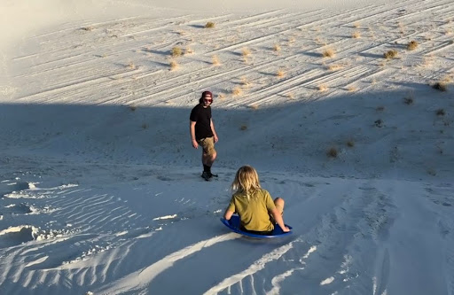 Sledding Down Sand Dunes at White Sands National Park 
