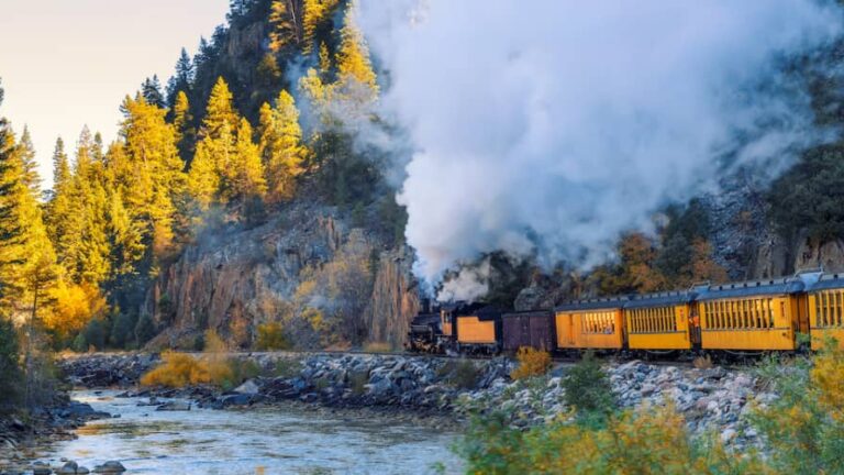 Durango-Silverton train headed through a canyon. Silverton is one of the most picturesque remote towns in the US
