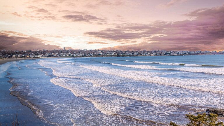 The ocean shimmers outside of Newport, Rhode Island, a Northeast International Destination Dupe