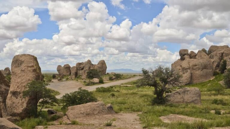 Rock formations against a blue sky dotted with clouds at Rockhound State Park. This is a great destination for rockhounding in the southwest