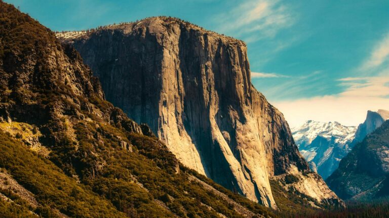 A granite rock face overlooks Yosemite Valley at Yosemite National Park