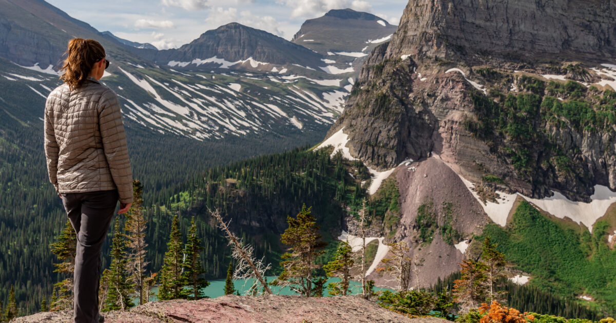 woman hiking in glacier national park