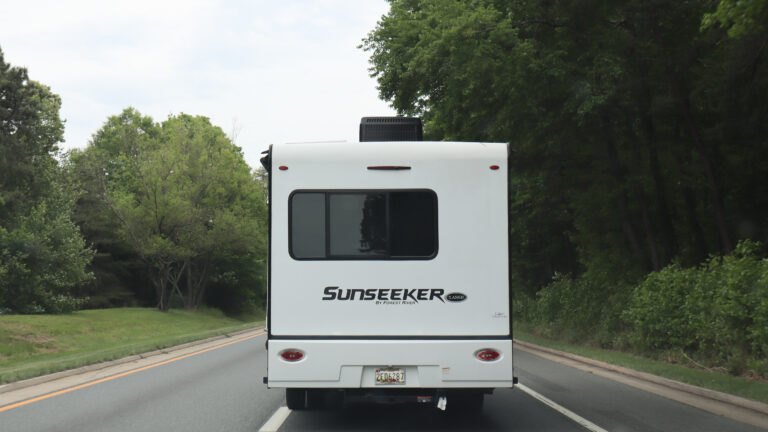 back of a sunseeker forest river motorhome on the highway