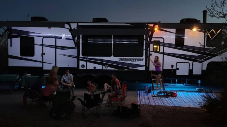 RVing with teens relxing in chairs with the RV in the background