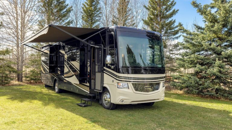 Motorhome sitting in grass, a perfect picture for selling your RV