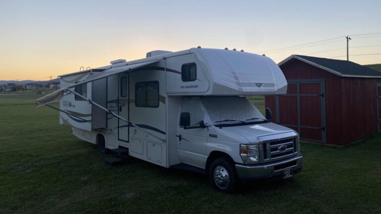 Our motorhome parked in a beautilful field in Montana, one of the best places to go RVing in 2026