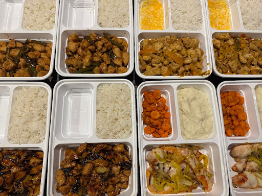 fresh Food prep lunches in containers in an RV fridge.