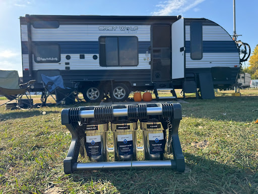 Glacier fresh unit out of the box in front of rv travel trailer to be used for water filtration