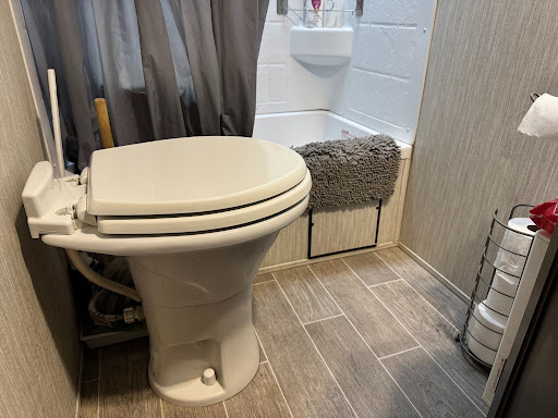 Dometic 310 Gravity Flush Toilet installed in our Camper